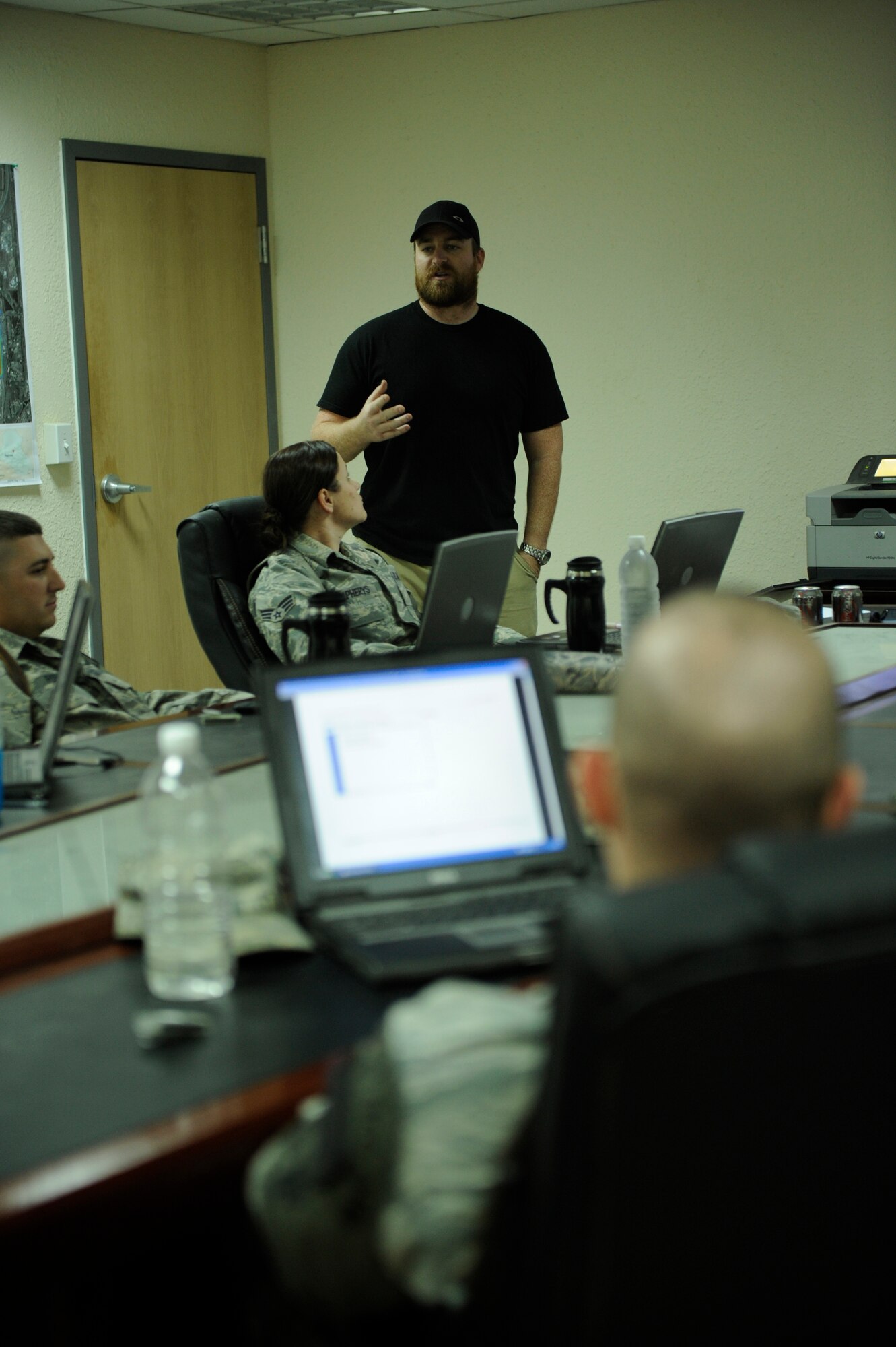 BAGHDAD -- Ryan May, in-country trainer for Science Applications International Corp., trains members from the 447th Expeditionary Security Forces Squadron on the Vehicle and Cargo Inspection System Feb. 19. The VACIS is a recent addition to the Sather Air Base vehicle inspection arsenal and increases the capability to provide security to the base. (U.S. Air Force photo by Staff Sgt. Levi Riendeau)