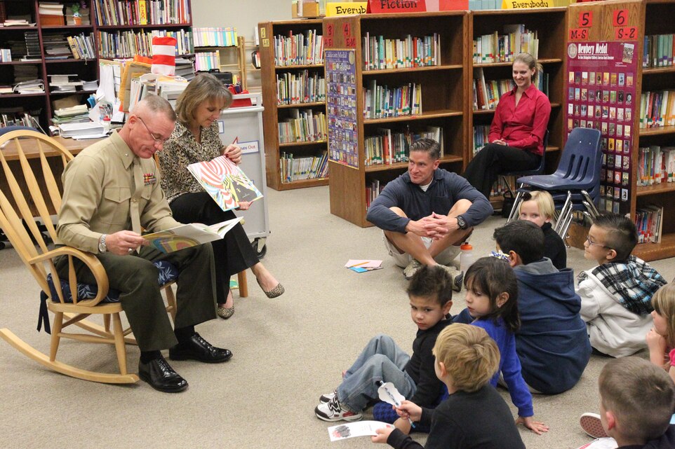 The Combat Center’s commanding general, Brig. Gen. H. Stacy Clardy III, reads “Oh the Places You’ll Go” by Dr. Seuss to students of Oasis Elementary and their families March 2, 2011.