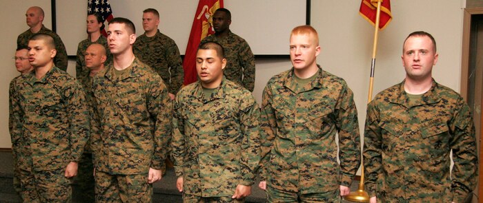 Students of 9th Marine Corps District’s first Corporals Course recite the NCO Creed March 3 at District headquarters. The course students and instructors comprised nearly half of the District headquarters noncommissioned officers.