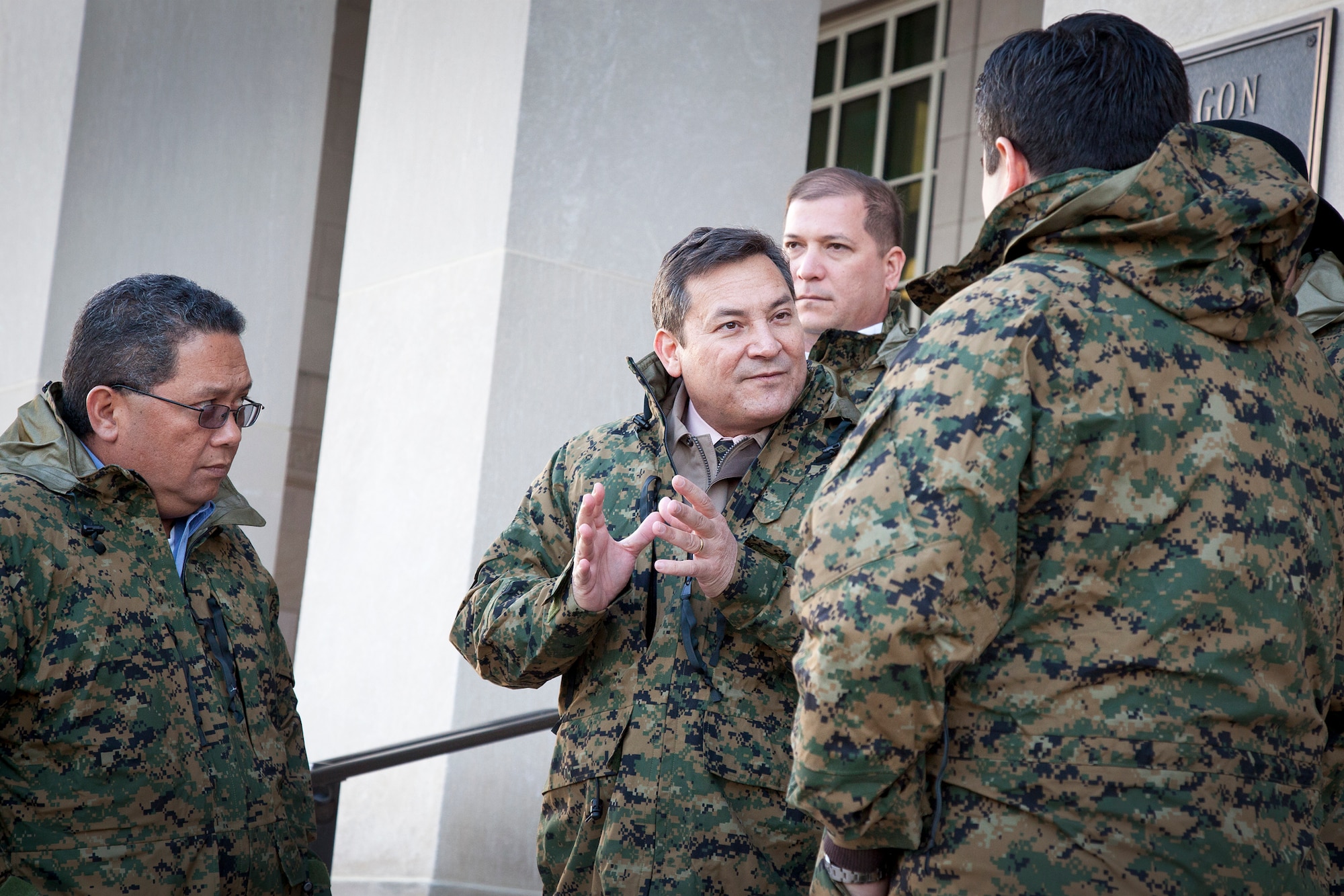 Gov. Eddie Baza Calvo of Guam discusses the planned relocation of Marines from Okinawa, Japan to Guam with a group of legislatures from the Pacific territory March 2, 2011. The governor and legislatures visited the Pentagon and toured Marine Corps Base Quantico, Va., to gather an understanding of the types of ranges planned for a new Marine Corps base on Guam.