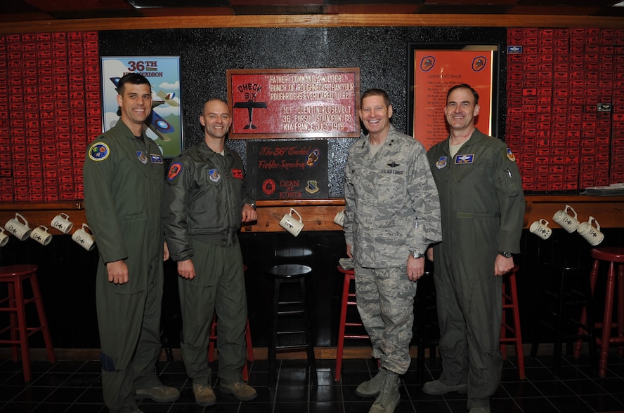 Maj. Gen. Robin Rand, Assistant to the Vice Chief of Staff of the Air Force, – and 85th “Fiend” commander of the 36th Fighter Squadron – right center, meets with current “Fiend” commander Lt. Col. John Seuell, left center, Lt. Col. Ralph Waite, 51st Operations Group deputy commander and 95th “Fiend” commander, far left, and Col. Mark DeLong, 51st Fighter Wing vice commander and 92nd “Fiend” commander, far right, at Osan Air Base, Republic of Korea, Feb. 10.
