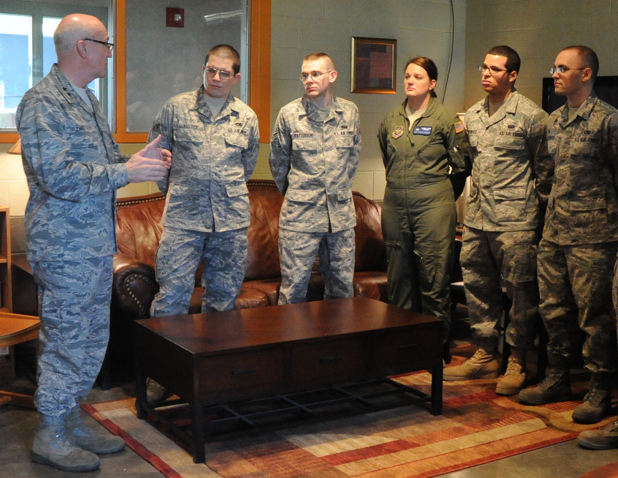 Chaplain (Maj. Gen.) Cecil R. Richardson, U.S. Air Force chief of chaplains, speaks with “den” leaders March 1, 2011, McConnell Air Force Base, Kan. The Den, located in Dorm 350, is McConnell’s Airmen Ministry Center. It  promotes spiritual readiness through formation, authentic communication, serving others and leadership development. (U.S. Air Force photo/Airman 1st Class Katrina M. Brisbin)
