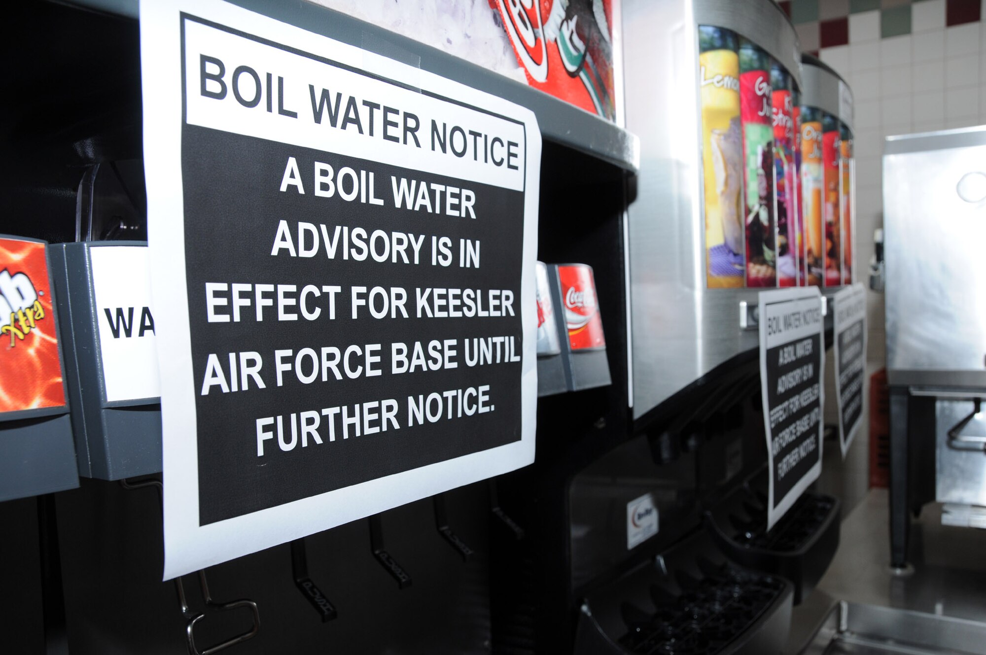 Signs are posted on fountain drink machines at the Azalea Dining Facility, Feb. 25.  (U.S. Air Force photo by Kemberly Groue)