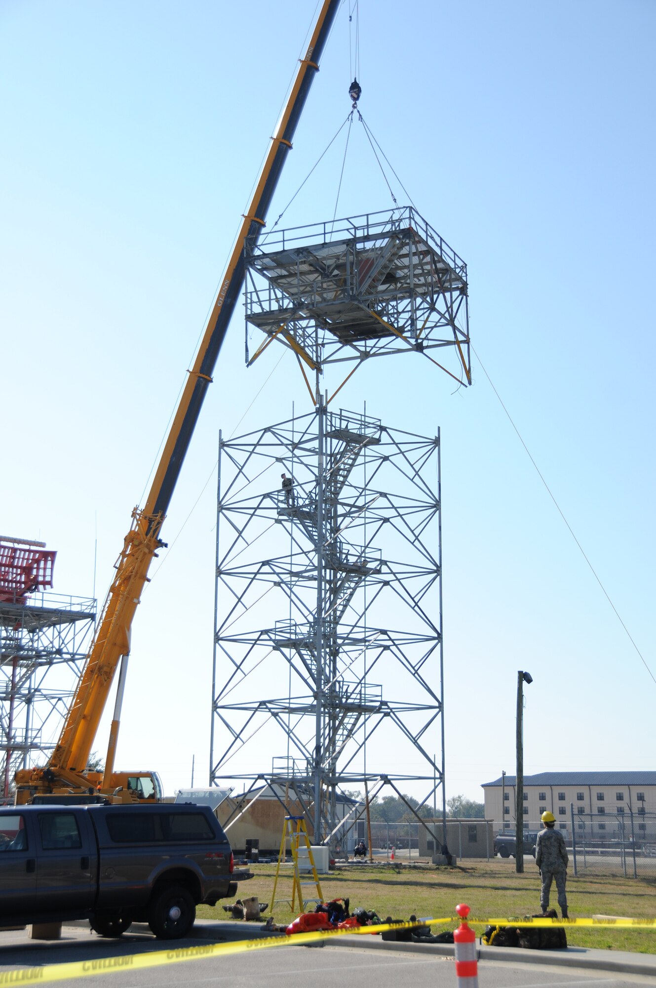 A team from the 85th EIS works on disassembling a GPN-20(V) tower Feb. 15.  (U.S. Air Force photo by Kemberly Groue)