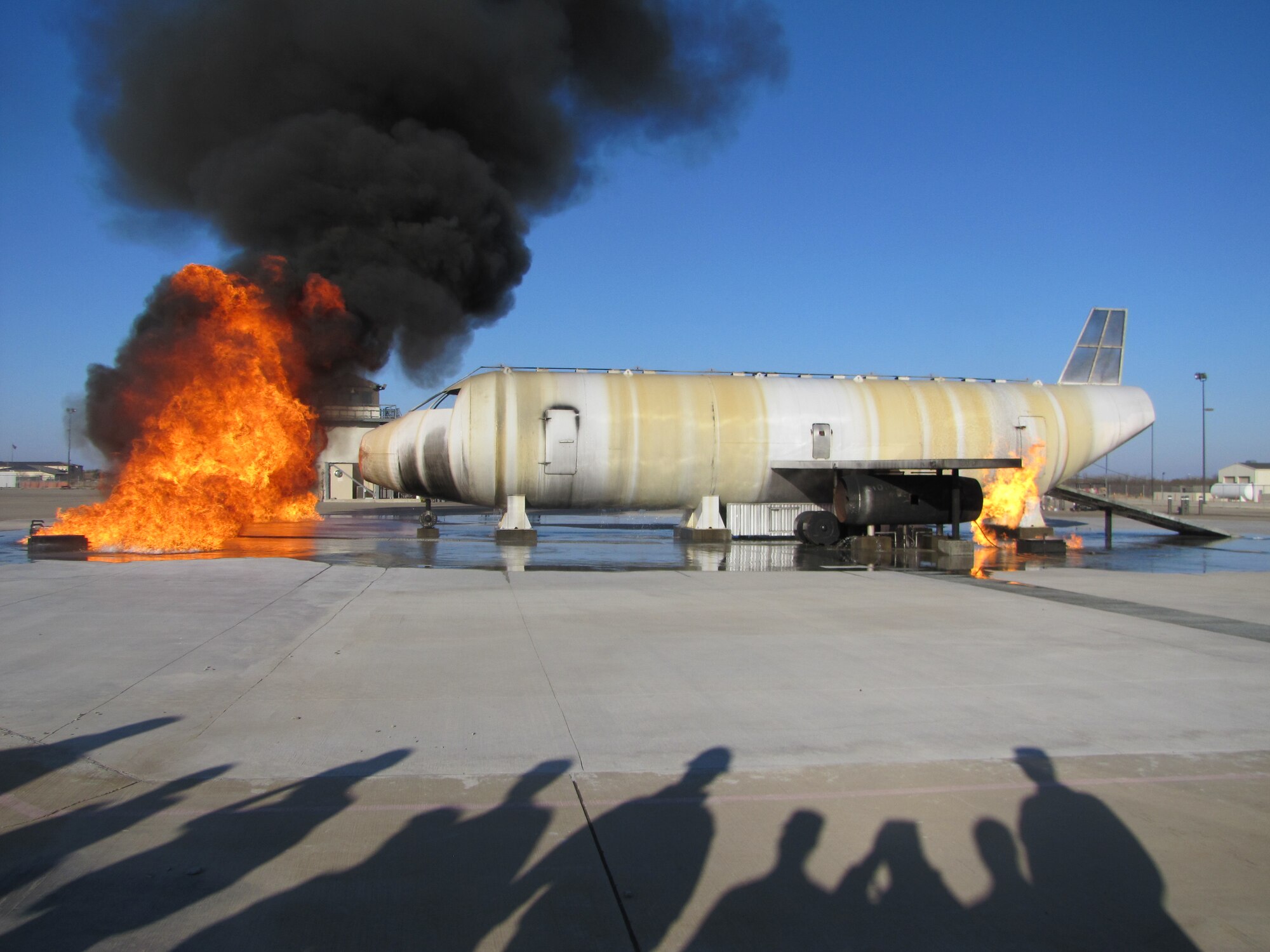 GOODFELLOW AIR FORCE BASE, Texas - Cadets from the Air Force Reserve Officer Training Corps, Angelo State University, watch a test burn at the Louis F. Garland Department of Defense Fire Academy Feb. 25. This was part of a two day training session designed to teach them what military life entails. (Courtesy photo) 