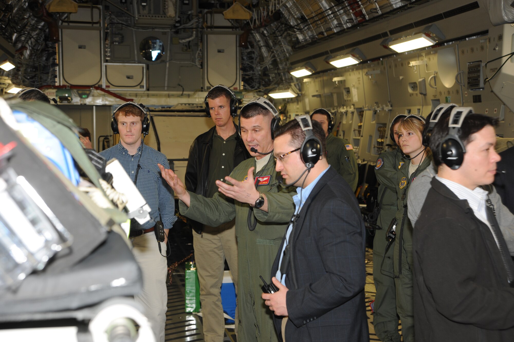 Maj.  Steve Urban, from 375th Aeromedical Evacuation Squadron at Scott Air Force Base, Ill., explains to Congressional staff members the aeromedical evacuation capabilities of different medical teams aboard a C-17 Globemaster III on Feb. 18, 2011. The Congressional staff members were afforded a firsthand look at airlift, airdrop and aeromedical aspects of Air Mobility Command’s mission. (U.S. Air Force Photo/Master Sgt. Jeff Capenos)