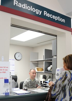 Tech. Sgt. Billy Cole, 22nd Medical Support Squadron Diagnostic Imaging assistant NCOIC, schedules an appointment for a Team McConnell member Feb. 23, 2011, McConnell Air Force Base, Kan. Diagnostic Imaging provides Team McConnell members with routine X-rays, mammography, bone density exams and ultrasounds. Diagnostic Imaging Airmen are accredited with the Joint Review Committee on Education in Radiologic Technology, and are nationally certified as radiologic technologists. (U.S. Air Force photo/Senior Airman Maria A. Ruiz)