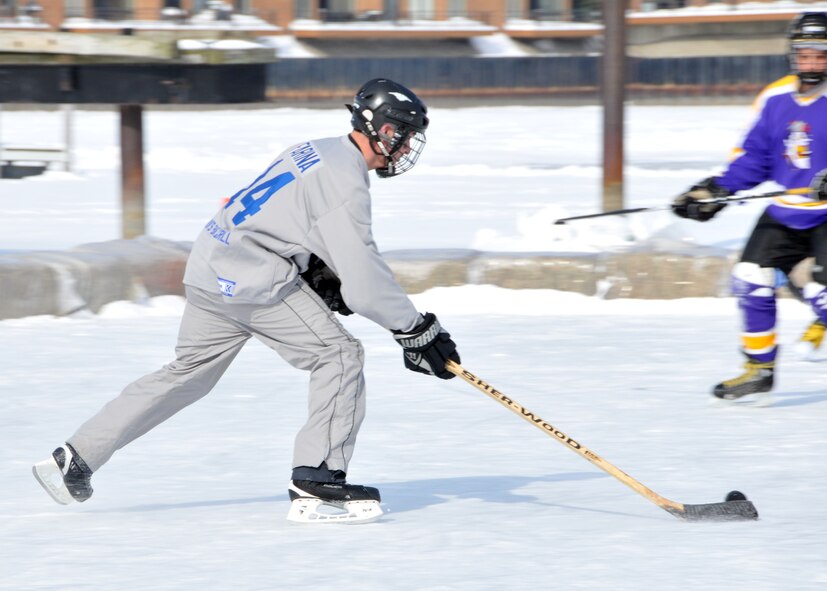 Members of the 914th Airlift Wing compete in the 2011 Labatt Blue Pond Hockey Tournament February 11, 2011 Buffalo, NY. Players compete in teams of four minus a goalie. (U.S. Air Force photo by Staff Sgt. Joseph McKee)