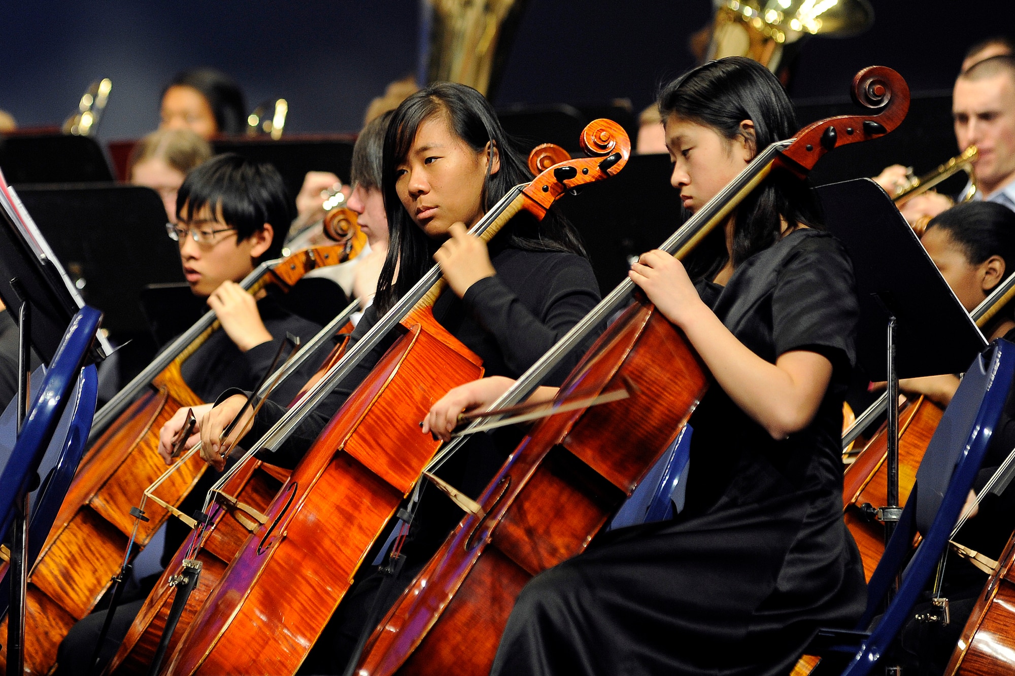 Cellists from the Pasadena Youth Orchestra participate in a concert with the Air Force Academy Band's Blue Steel ensemble Feb. 20, 2011, in the Academy's Arnold Hall Theater. This was the seventh such concert featuring Blue Steel and members of youth symphonies. (U.S. Air Force photo/Megan Davis)