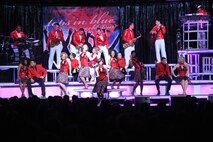 MINOT, N.D. – Members of Tops in Blue perform for the Minot community at the State Fair Grounds here Feb. 23. Tops in Blue serves as an expeditionary entertainment unit to provide quality entertainment from within Air Force resources for the Air Force family and personnel. (U.S. Air Force photo/Staff Sgt. Keith Ballard)