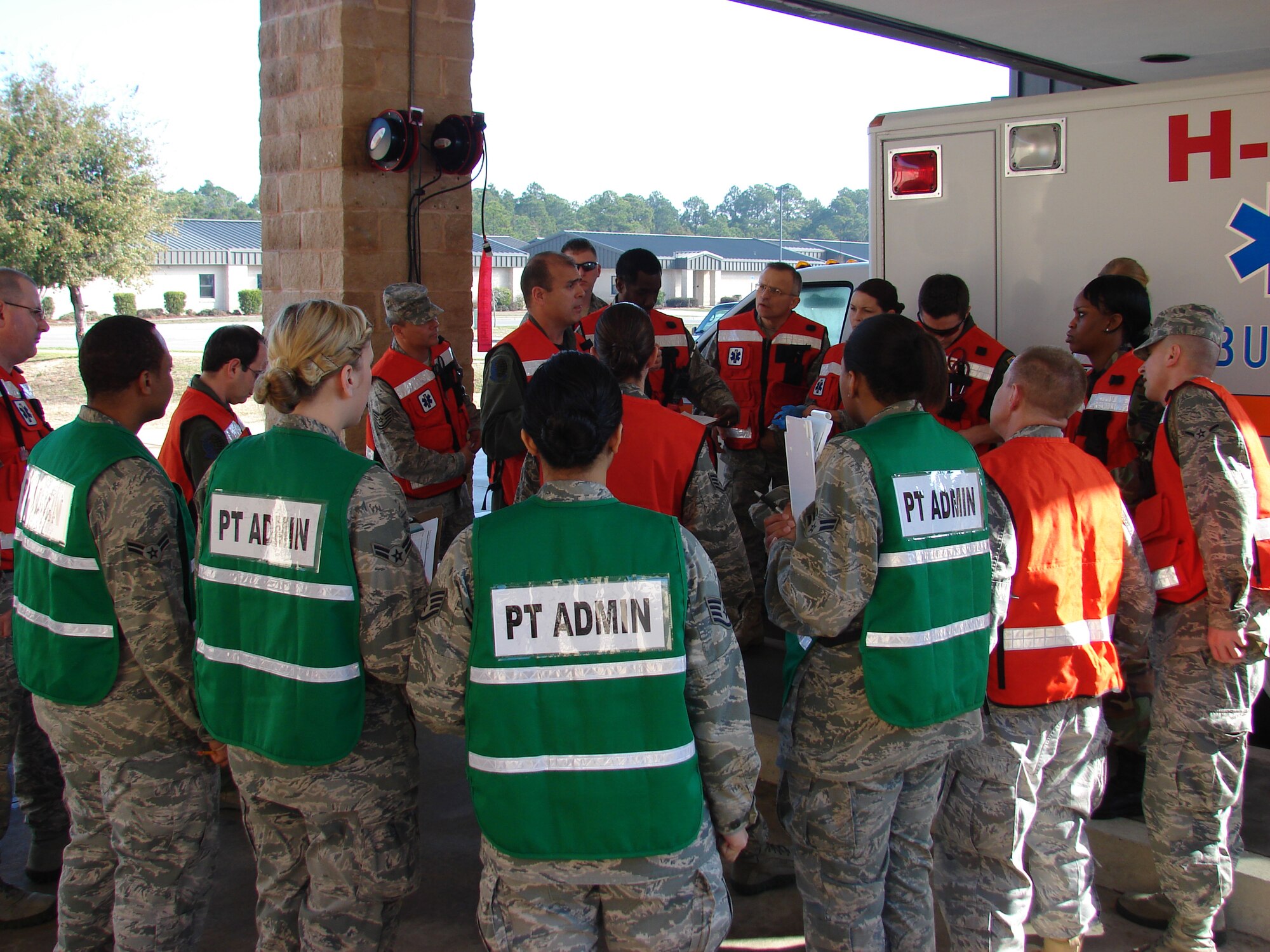 Maj. Victor Ortiz, 1st Special Operations Aerospace Medicine Squadron flight surgeon, center, prepares a field response team before heading to a simulated incident scene during an All Hazards Response Training exercise at Hurlburt Field, Fla., Feb. 14-18, 2011. The AHRT exercise was designed to facilitate cooperation between emergency responders for disasters or major incidents. (Courtesy photo)


