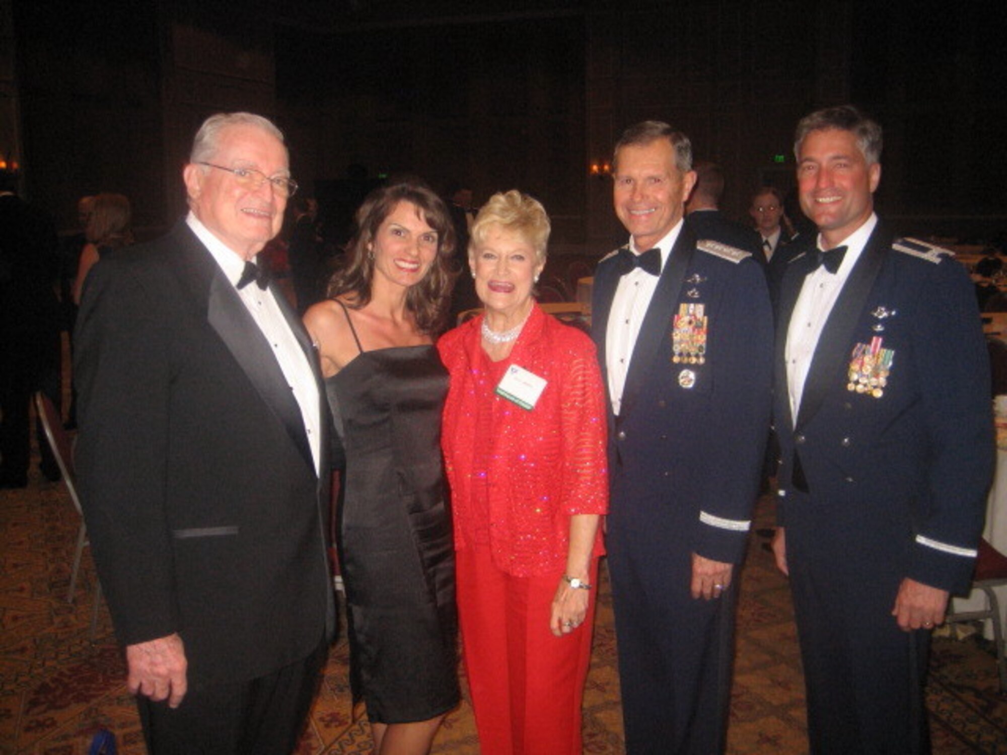 ORLANDO, Fla. -- From left to right, Parker Greene, Moody Support Committee chairman, Kelly DeMaso, Dr. Lucy Greene, Gen. William Fraser III, Air Combat Command commander, and Col. William DeMaso, 23rd Wing vice commander, pose for a photo Feb. 18 during the Air Force Association Air Warfare Symposium and Technology Exposition. (courtesy photo)