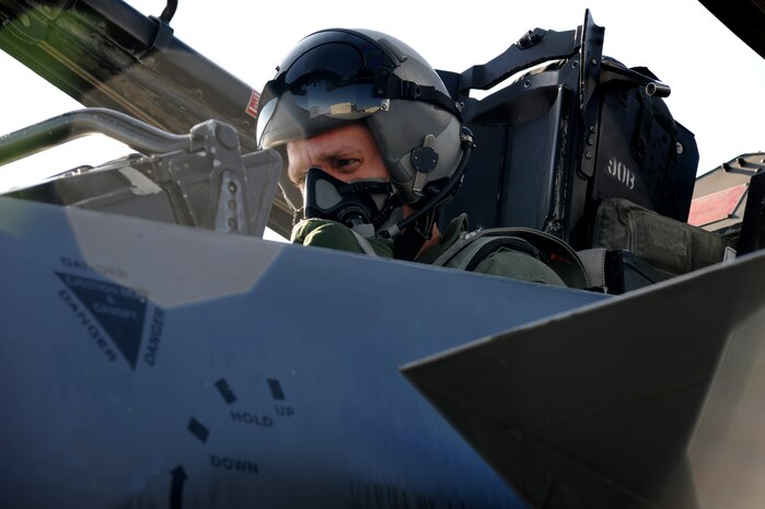 Staff Sgt. Robert Pennington sits in the cockpit of an F-15E Strike Eagle before his incentive flight, Feb. 26 on Joint Base Charleston - Air Base. The 333rd Fighter Squadron out of Seymour Johnson Air Force Base gave incentive flights to outstanding airmen from Joint Base Charleston and Seymour Johnson . Sergeant Pennington is a Propulsion Specialist with the 437th Maintenance Group. (U.S. Air Force photo/Staff Sgt. Nicole Mickle)