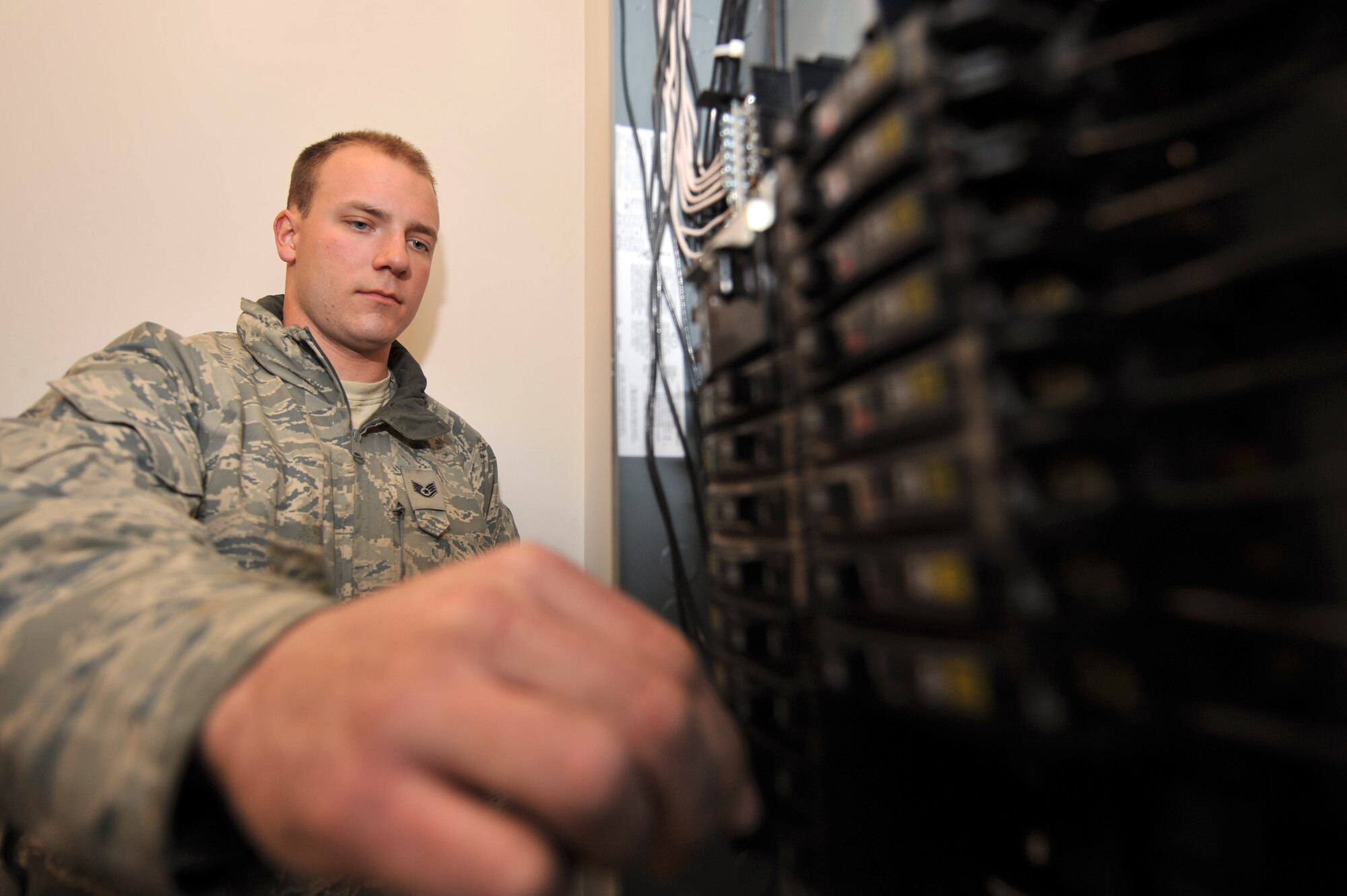 Staff Sgt. Ryan Sendrick, 455th Expeditionary Civil Engineer Squadron electrician, checks the electrical box to ensure there is proper voltage before hooking up any military equipment at Bagram Airfield Afghanistan, March 3, 2011. Sergeant Sendrick is deployed from the 177th Fighter Wing Air National Guard, N.J. (Air Force photo by Senior Airman Sheila deVera)