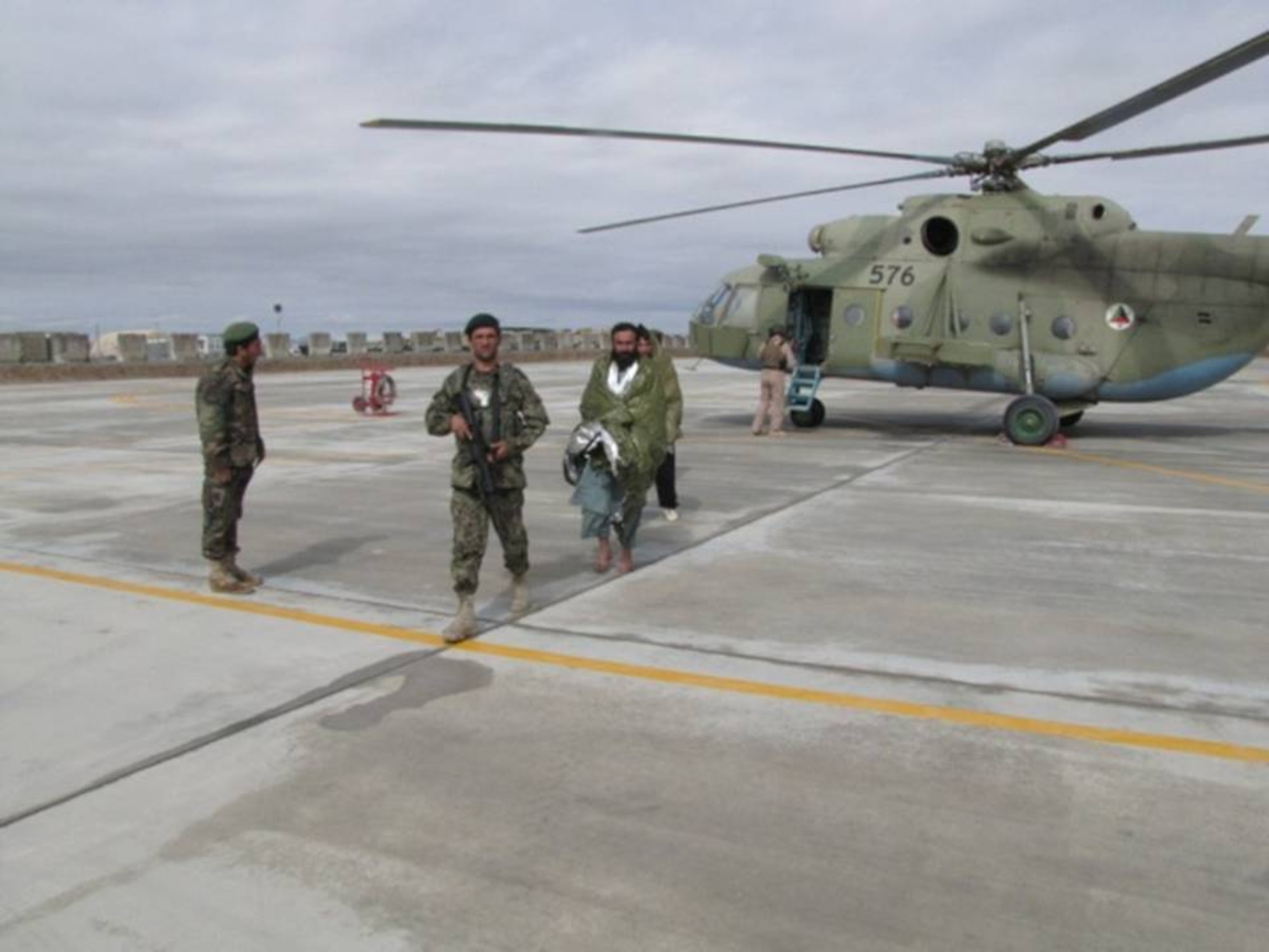 KANDAHAR, Afghanistan - Two stranded men were safely rescued from flash flood and returned to Kandahar Mar. 1. (U.S. Air Force photos). 