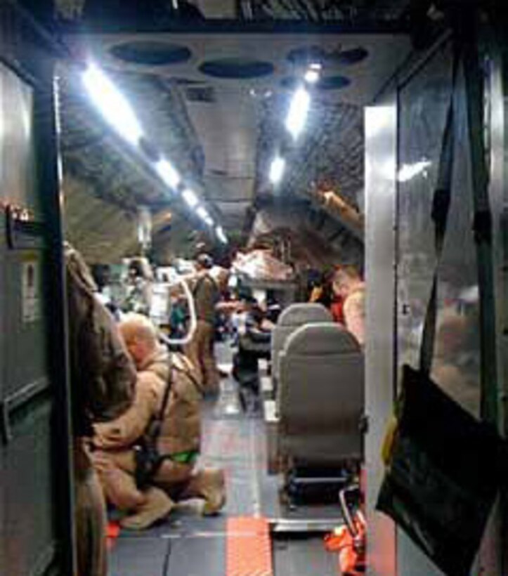 Lighting assists in-flight intensive care providers as wounded soldiers are airlifted from
Bagram AB, Afghanistan, to Ramstein AB, Germany. (Photo by Lt. Col. Lee Grunberger)