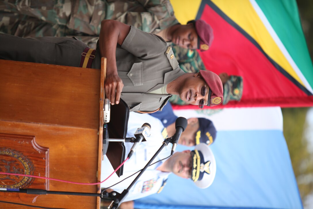 Royal Antigua and Barbuda Defense Force Maj. Randolph Best, addresses U.S. Marines and 21 partner nation coast guard, law enforcement and ground forces during the opening ceremony for exercise Tradewinds 2011.::r::::n::