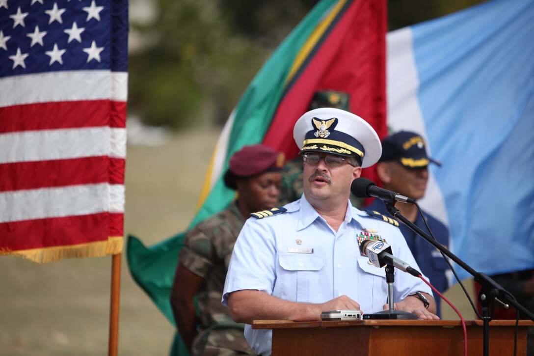 Royal Antigua and Barbuda Defense Force Maj. Randolph Best, addresses U.S. Marines and 21 partner nation coast guard, law enforcement and ground forces during the opening ceremony for exercise Tradewinds 2011.