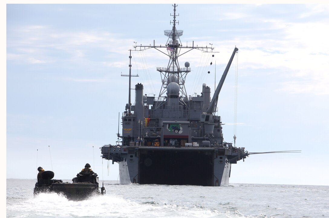 Marines with Bravo Company, 3rd Assault Amphibian Battalion, head toward the USS Dubuque (LPD 8) in an amphibious assault vehicle off Camp Pendleton's coast, March 2. Bravo Company is participating in Pacific Horizon 11, a maritime prepositioning force exercise to prepare Marines and sailors for crisis response. (U.S. Marine Corps Photo by Sgt. Marcy Sanchez)