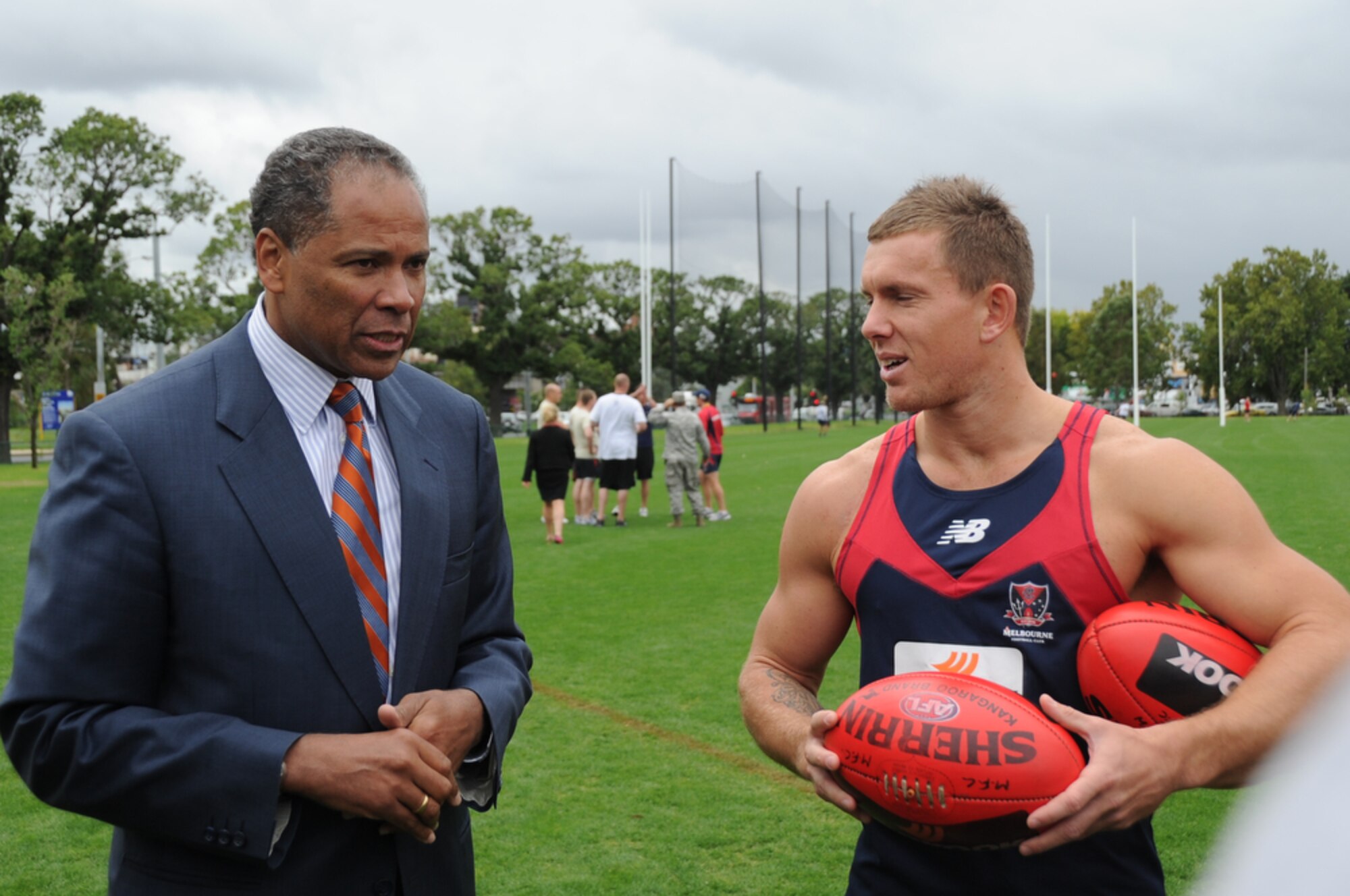 Airmen joined Sailors in gaining some knowledge about Australian Rules Football from players representing the Melboune Demons Football Club at Gosch’s Paddock in Melbourne, Australia, March 4, 2011. The Airmen are from Kadena Air Base, Japan, and Dyess Air Force Base, Texas, while the Sailors are from the  San Diego-based USS Shoup. The two groups took time out from attending the Avalon 2011 Australian International Airshow and Aerospace and Defence Exposition in Geelong, Australia. The event is one of the largest airshows in the world. The U.S. and Australian alliance spans more than 60 years and provides an opportunity for U.S and senior military officials to engage with their Australian counterparts, and ultimately contribute toward interoperability between the forces. (U.S.  Air Force photo/Master Sgt. Cohen A. Young)