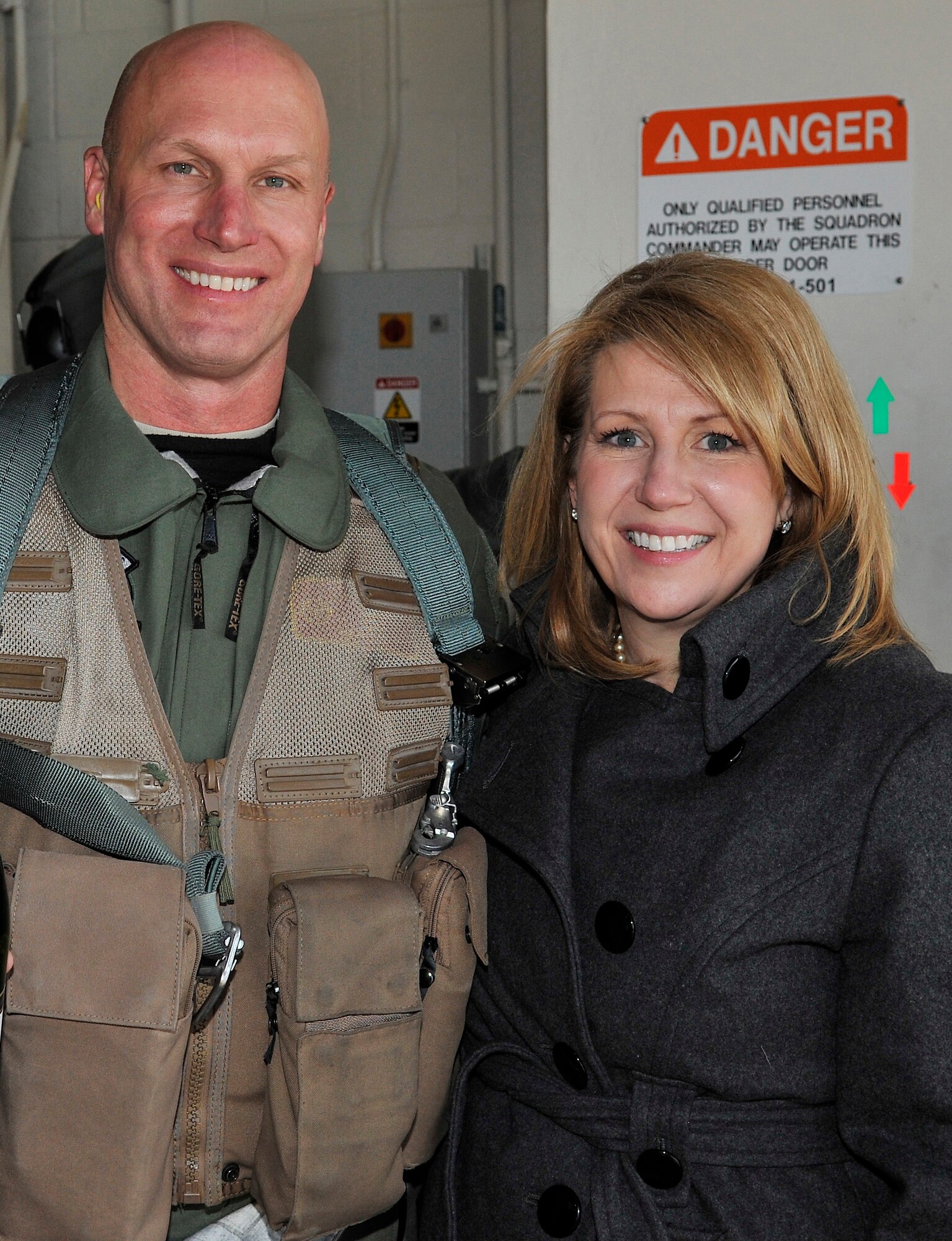 Brigadier General James N. "Bull" Post III shares a moment with his wife, Susan Post, after completing his 2565th sortie Mar. 3, 2011, Eielson Air Force Base, Alaska. General Post achieved 4000.4 flying hours in the F-16 Fighting Falcon. The milestone places him in an elite corner of the F-16 community. General Post is the 354th Fighter Wing Commander. (U.S. Air Force photo/Staff Sgt. Christopher Boitz/released)