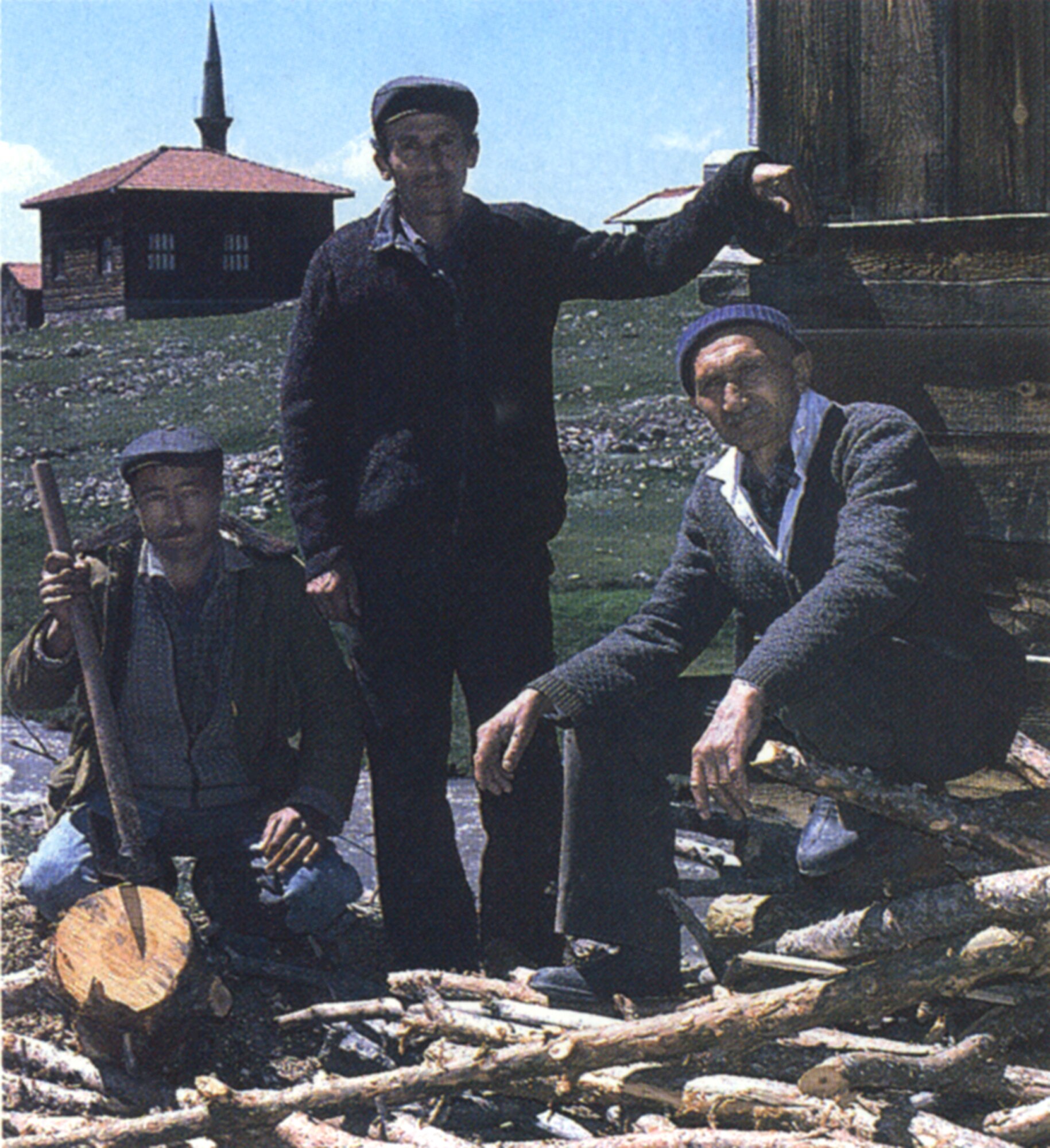 MIRACLE ON THE MOUNTAIN - "Guardian angels" Murat Bayram, Ruhi Karababac and Ismail Keklikci (left to right) were among some 17 Turkish lumberjacks who rescued the Couillards. Keklikci, the first to discover Mike, said it was a fluke the woodcutters were even in the area. "We had never cut timber there before." (Photo by Rose Reynolds)
