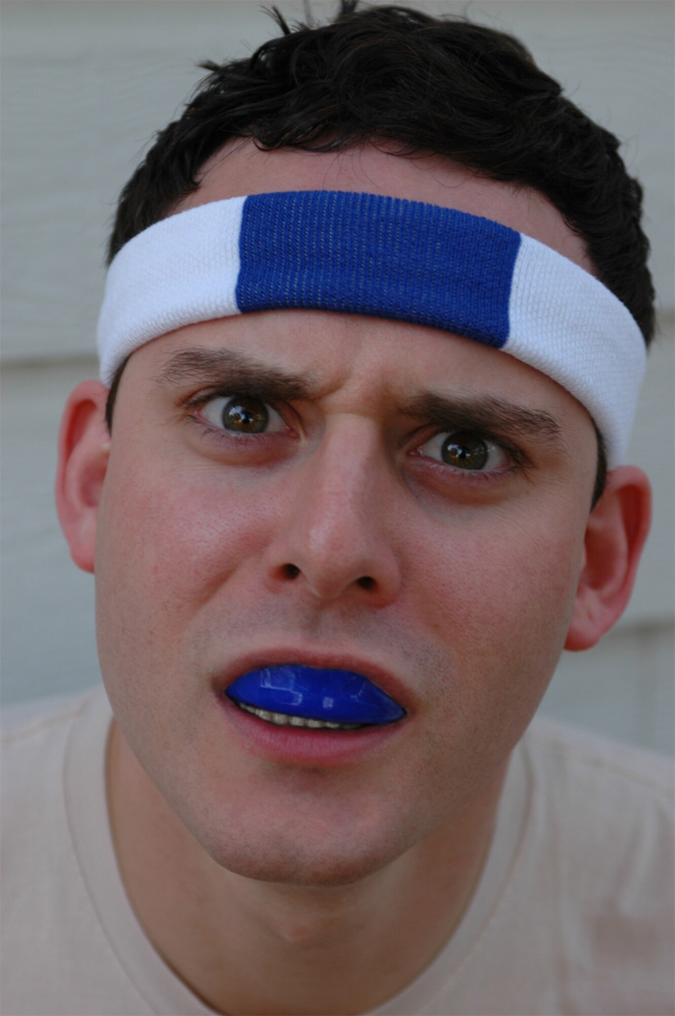 SOMETHING TO SMILE ABOUT - Mouthpieces like this "boil and bite" version not only help protect users from broken or lost teeth, but from concussions as well. (Photo by Timothy Barela)