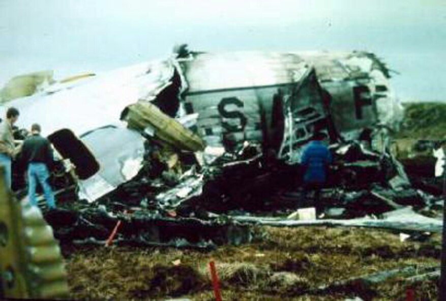 SHEMYA AIR FORCE BASE, Alaska -- The remains of Cobra Ball 61-2664 is surveyed by onlookers following its crash here on March 15, 1981. Six crew members lost their lives when the aircraft crashed upon landing. (Photo courtesy of K.A. Crooks)