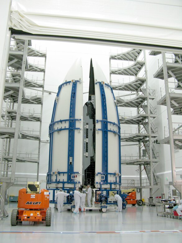 The US Air Force X-37B Orbital Test Vehicle during encapsulation within the
United Launch Alliance Atlas V 5-meter fairing Feb. 8, 2011, at Astrotech in Titusville, Fla. The fairing protects and carries the OTV into space. (Courtesy photo)
