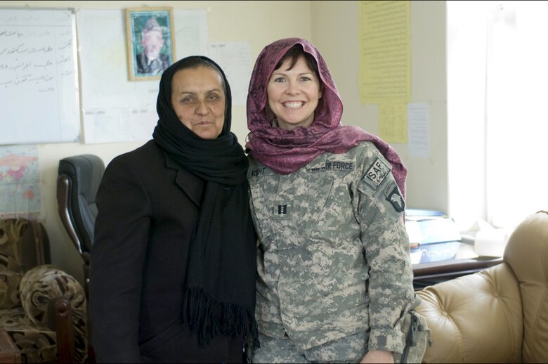 Capt. Ann Voght meets with Ms. Kohistani, the director of the provincial department of women's affairs in Mahmud-E Raqi, Afghanistan. Captain Voght is a medical officer assigned to Provincial Reconstruction Team Kapisa. (U.S. Air Force photo/Staff Sgt. Kyle Brasier)