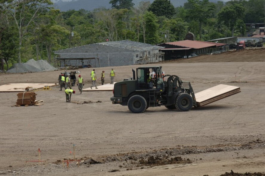Reservists with the 567th RED HORSE Squadron prepare a site in Panama for a floor laydown. Airmen deployed in 2010 as part of New Horizons to support base build-up and tear down in the area. (USAF photo courtesy of 567RHS)