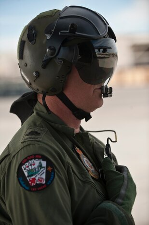 NELLIS AIR FORCE BASE, Nev. -- Royal Australian Air Force Warrant Officer Col Lubbock, No. 37 Squadron load master, from Richmond, Australia goes over pre-flight checks on a C-130H Hercules before a training mission during Red Flag 11-3, March 1.   Red Flag is a realistic combat training exercise involving the air forces of the United States and its allies. The exercise takes place north of Las Vegas on the Nevada Test and Training Range--the U.S. Air Force's premier military training area with more than 12,000 square miles of airspace and 2.9 million acres of land. (U.S. Air Force photo by Tech Sgt. Michael R. Holzworth)
