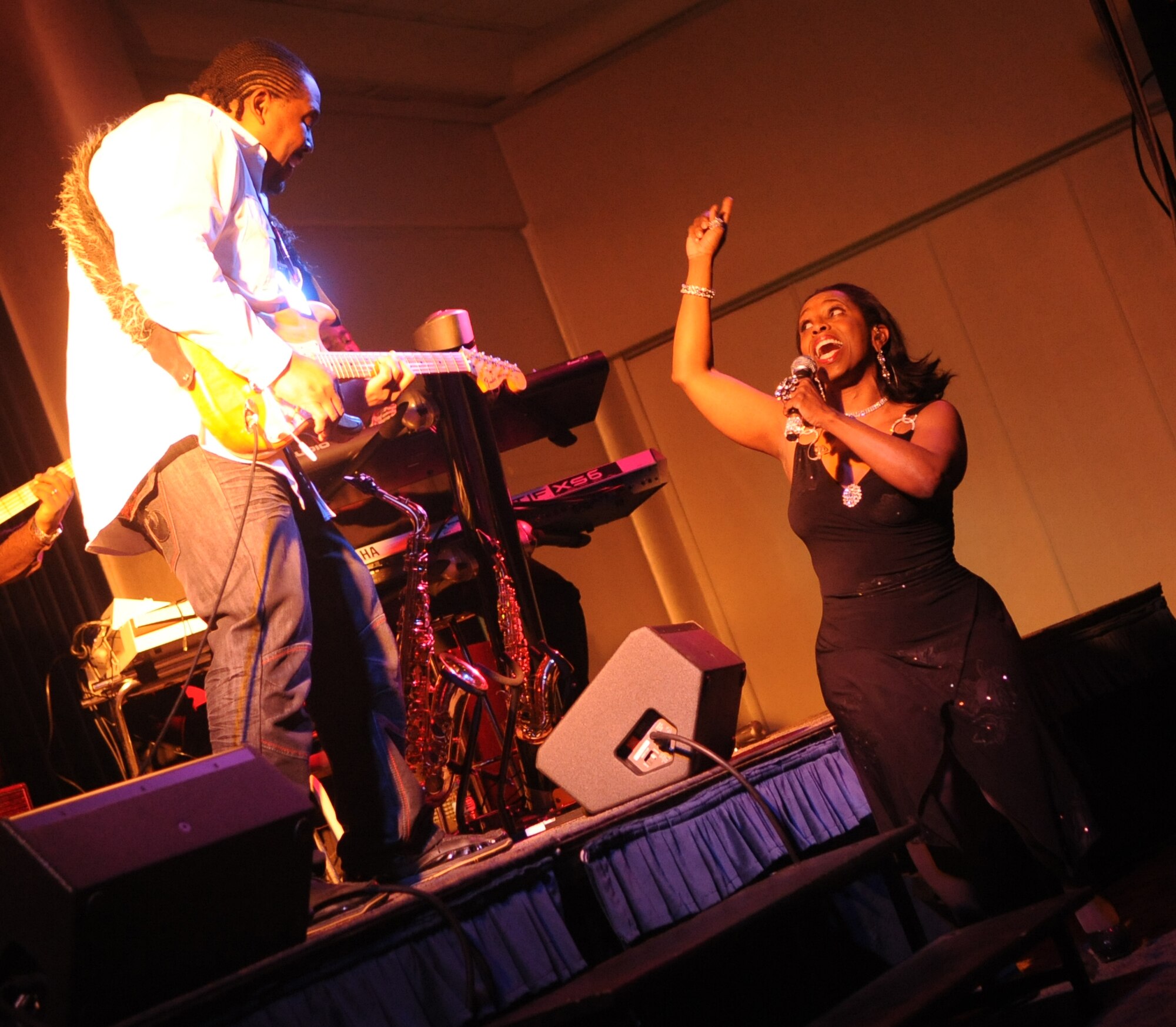 James Perry II and Yolanda Rabun perform during a concert Feb. 19, 2011, at Incirlik Air Base, Turkey. Mr. Perry and Ms. Rabun are members of the jazz band, The Stanley Baird Group. The group performed for two hours to boost the morale of Airmen stationed at the base. The group is one of many entertainment groups chosen by Armed Forces Entertainment to entertain service members stationed overseas.