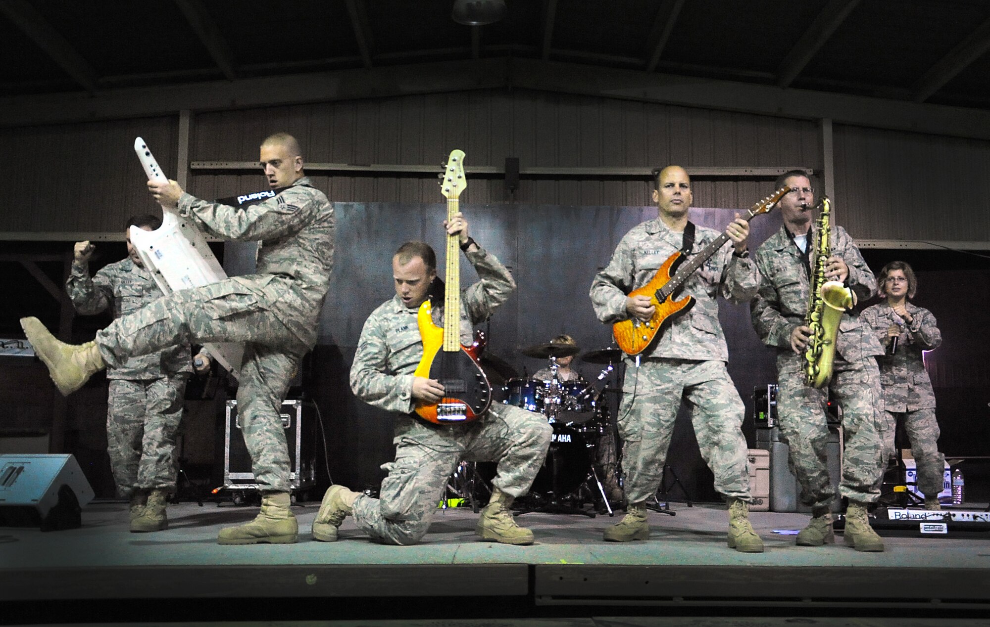 With a variety of insrtuments the U.S. Air Forces Central Band, Starlifter, showed off their musical skills during their visit to the 386th Air Expeditionary Wing Feb. 25. The band performed a variety of music genres from various artisits to include, jazz, country, classic rock, 80s for Rock Airmen. (U.S. Air Force photo by Senior Airman Cynthia Spalding)