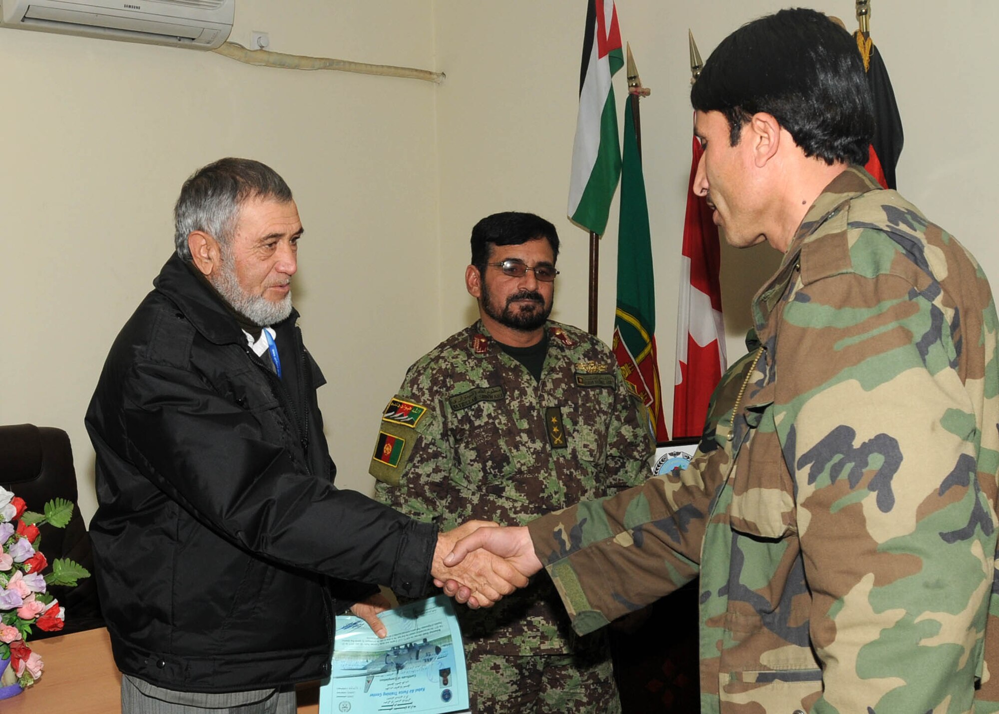 KABUL, Afghanistan - Thirteen members of the Afghan Air Force graduated from the Aerial Technical Instructor course and the C-27 Engine and Body course from Pohantoon-e-Hawayee, the Afghan Air Force's "Big Air School", on the Afghan Air Force base in Kabul, Afghanistan Mar. 3. (U.S. Navy photos by Mass Communications Specialist 3rd Class Jared E. Walker)