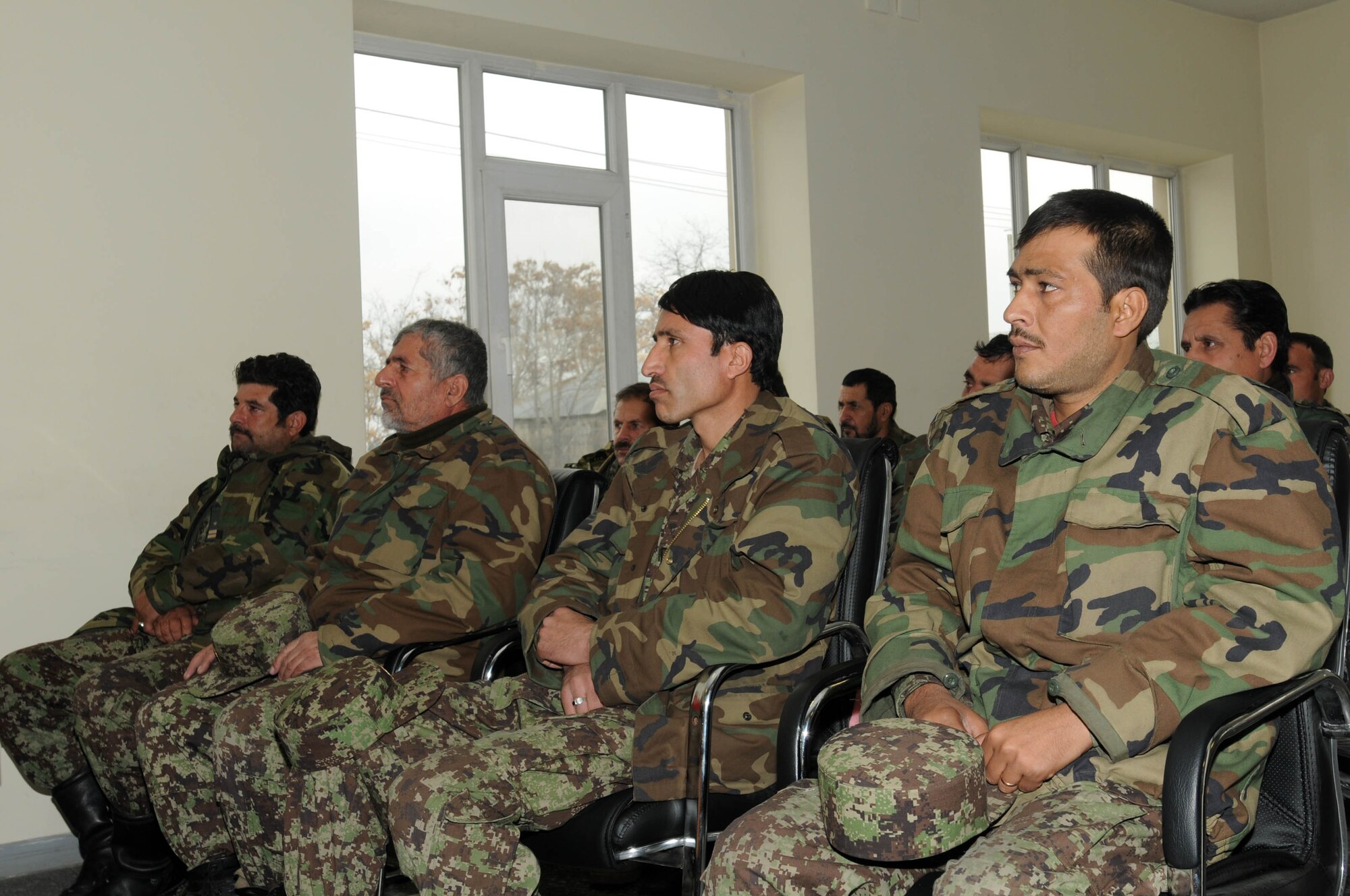 KABUL, Afghanistan - Thirteen members of the Afghan Air Force graduated from the Aerial Technical Instructor course and the C-27 Engine and Body course from Pohantoon-e-Hawayee, the Afghan Air Force's "Big Air School", on the Afghan Air Force base in Kabul, Afghanistan Mar. 3. (U.S. Navy photos by Mass Communications Specialist 3rd Class Jared E. Walker)