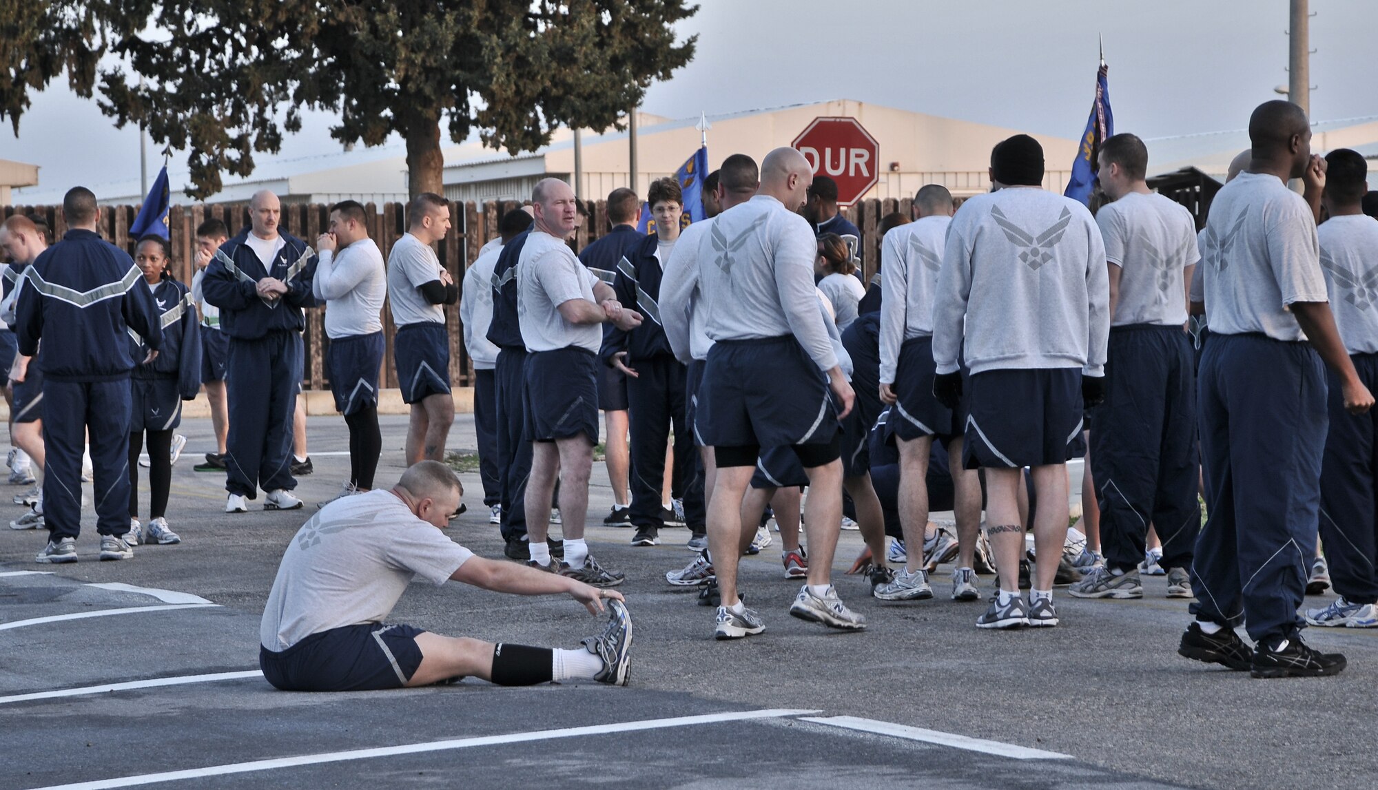 Airmen from the 39th Air Base Wing stretch and prepare for a wing run Feb. 24, 2011, at Incirlik Air Base, Turkey. The run was intended to boost morale and build camaraderie between the Airmen and was held in conjunction with resiliency training during Winter Wingman Day 2011.  (U.S. Air Force photo by Staff Sgt. Alex Montes/Released)