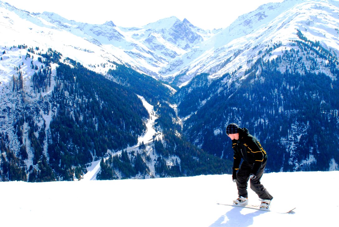 Sgt. Jordan Eads, the orders chief with Marine Forces Europe, snowboards in the Austrian Alps. Marine Forces Europe's Single Marine Program organized and executed a successful ski trip to St. Anton, March 4.::r::::n::