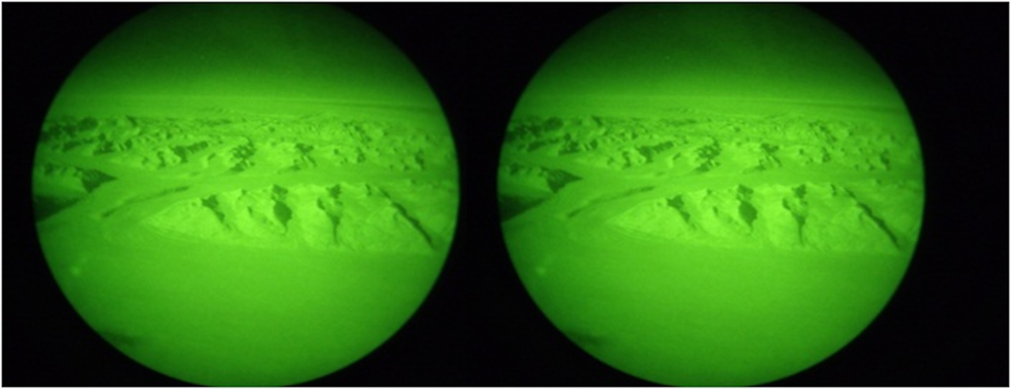 A view of Antarctica through the eyes of a pair of C-17 Globemaster III Night Vision Goggles at McMurdo Station, Antarctica, as part of Operation Deep Freeze 2010-2011. ODF is the U.S. military's operational and logistic support of the NSF's scientific research activities in Antarctica.  (U.S. Air Force photo/ Lt. Col. Robert Wellington)

