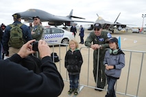 A visitor takes a photo of the F-22 Raptor during the 2011 Avalon International Airshow in Geelong, Australia, March 4, 2011. The event is one of the largest airshows in the world. In addition to the F-22, several other U.S. Air Force aircraft were displayed at the event including the B-1B Lancer, the C-17 Globemaster III, the and the C-130J Hercules. The airshow serves as an opportunity for U.S and senior military officials to engage with their Australian counterparts, and ultimately contribute toward interoperability between the forces.  (U.S. Air Force photo/Master Sgt. Cohen A. Young)