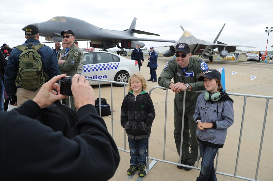 A visitor takes a photo of the F-22 Raptor during the 2011 Avalon International Airshow in Geelong, Australia, March 4, 2011. The event is one of the largest airshows in the world. In addition to the F-22, several other U.S. Air Force aircraft were displayed at the event including the B-1B Lancer, the C-17 Globemaster III, the and the C-130J Hercules. The airshow serves as an opportunity for U.S and senior military officials to engage with their Australian counterparts, and ultimately contribute toward interoperability between the forces.  (U.S. Air Force photo/Master Sgt. Cohen A. Young)