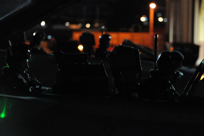 Royal Air Force Pilots, No.9 Squadron, prepare for a night mission during Red Flag 11-3 at Nellis Air Force Base, Nev., March 03, 2011. Red Flag is a realistic combat training exercise involving the air forces of the United States and its allies. The exercise takes place north of Las Vegas on the Nevada Test and Training Range--the U.S. Air Force's premier military training area with more than 12,000 square miles of airspace and 2.9 million acres of land.(U.S. Air Force photo by Airman 1st Class Daniel Hughes/Released)