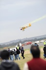 Visitors watch an aerial demonstration at the 2011 Avalon International Airshow in Geelong, Australia, March 4, 2011. The event is one of the largest airshows in the world. This year's event also celebrates the 90th anniversary of the Royal Australian Air Force. Several U.S. Air Force aircraft were displayed at the event including the F-16 Fighting Falcon, the C-17 Globemaster III, the F-22 Raptor and the C-130J Hercules. (U.S. Air Force photo/Master Sgt. Cohen A. Young)