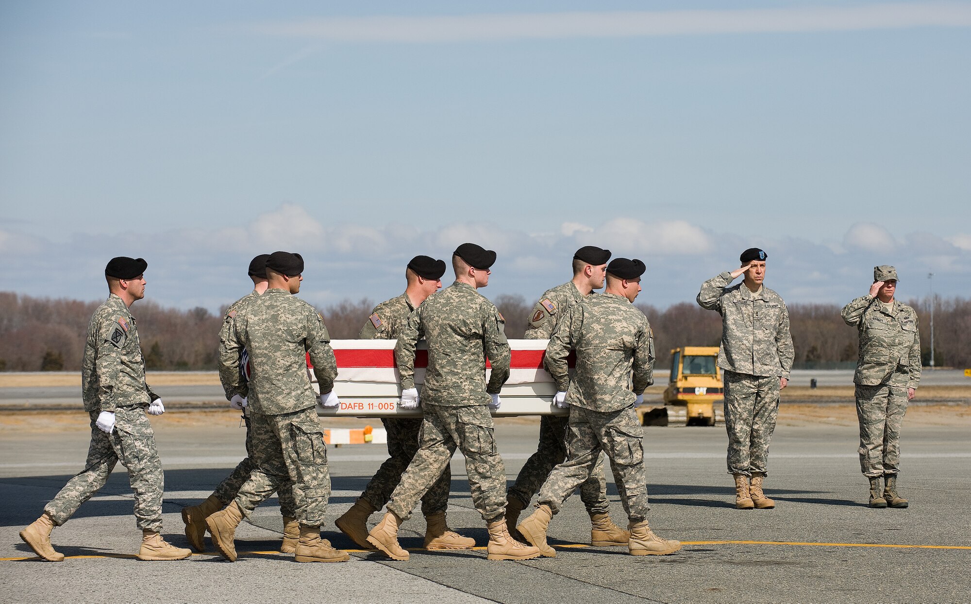 A U.S. Army carry team transfers the remains of Army Sgt. Kristopher J. Gould of Saginaw, Mich., at Dover Air Force Base, Del., March 4, 2011. (U.S. Air Force photo/Jason Minto)