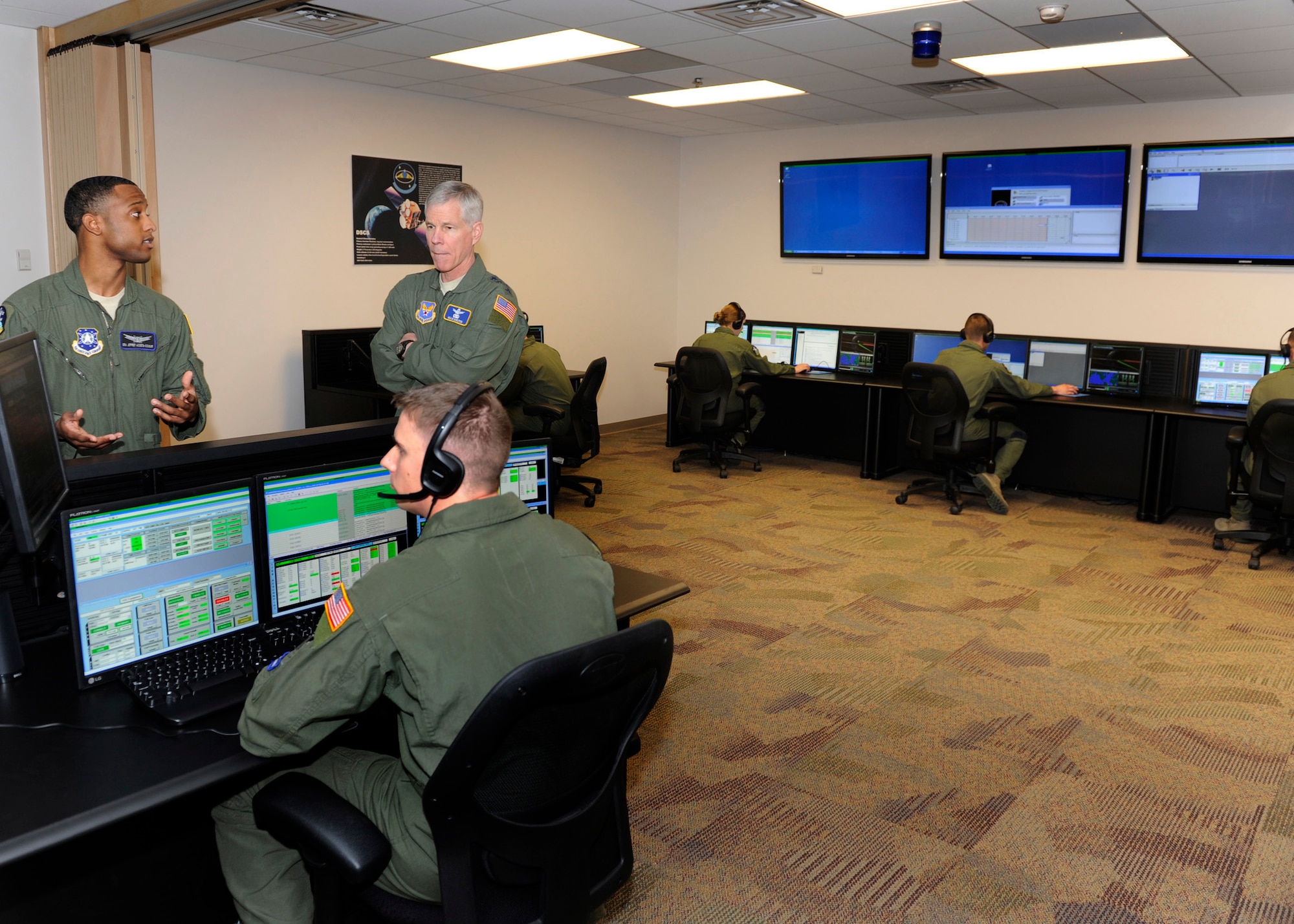 General William Shelton, Air Force Space Command commander, visits the Standard Space Trainer Integrated Training Center at Schriever Air Force Base, Feb.  25. The center trains satellite operators in a realistic setting. Spearheaded by the Space and Missile Systems Center Space Training Acquisition Office, Air Force Research Lab and AETC in 2006, the project was envisioned as a cost effective, quality training system built on a common training architecture.
 