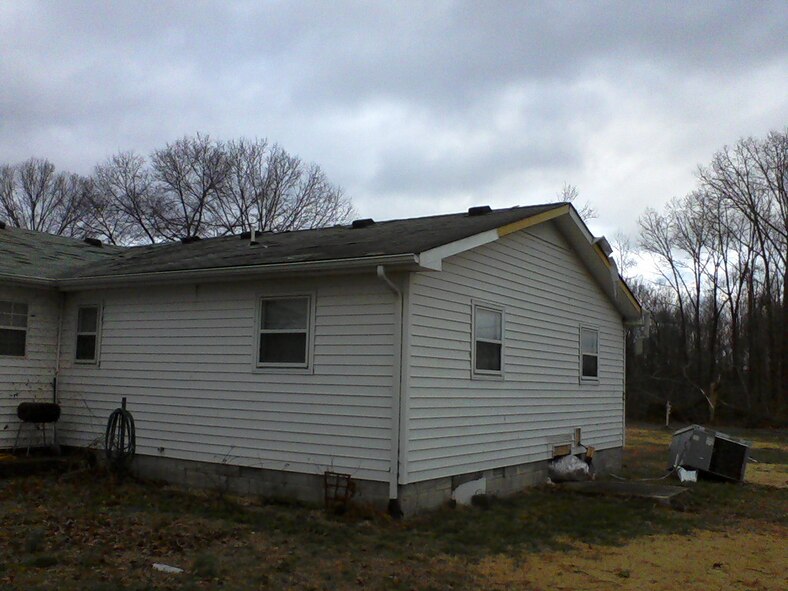The tornado that tore through northern Franklin County Feb. 28 tossed Daryl Justice’s heating unit into the yard and blew shingles off his roof. Justice is ATA’s emergency management lead. (Photo provided)