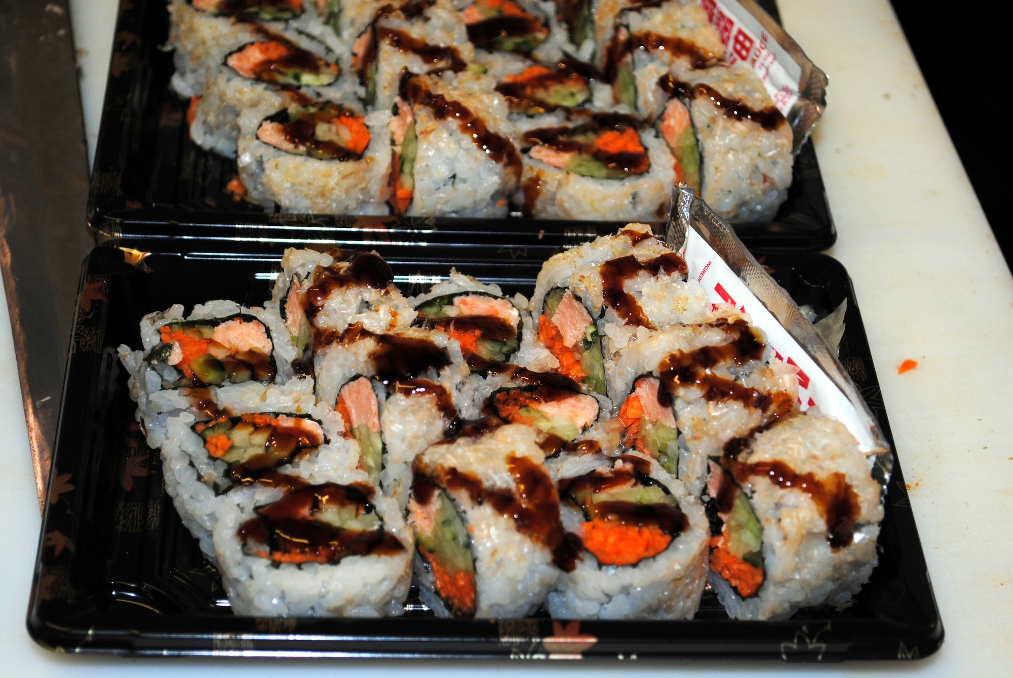 A tray of sushi is ready to be packaged for sale. The chefs will make anywhere from 20 to 40 different kinds of sushi a day. (U.S. Air Force photo/Airman Cortney Hansen)