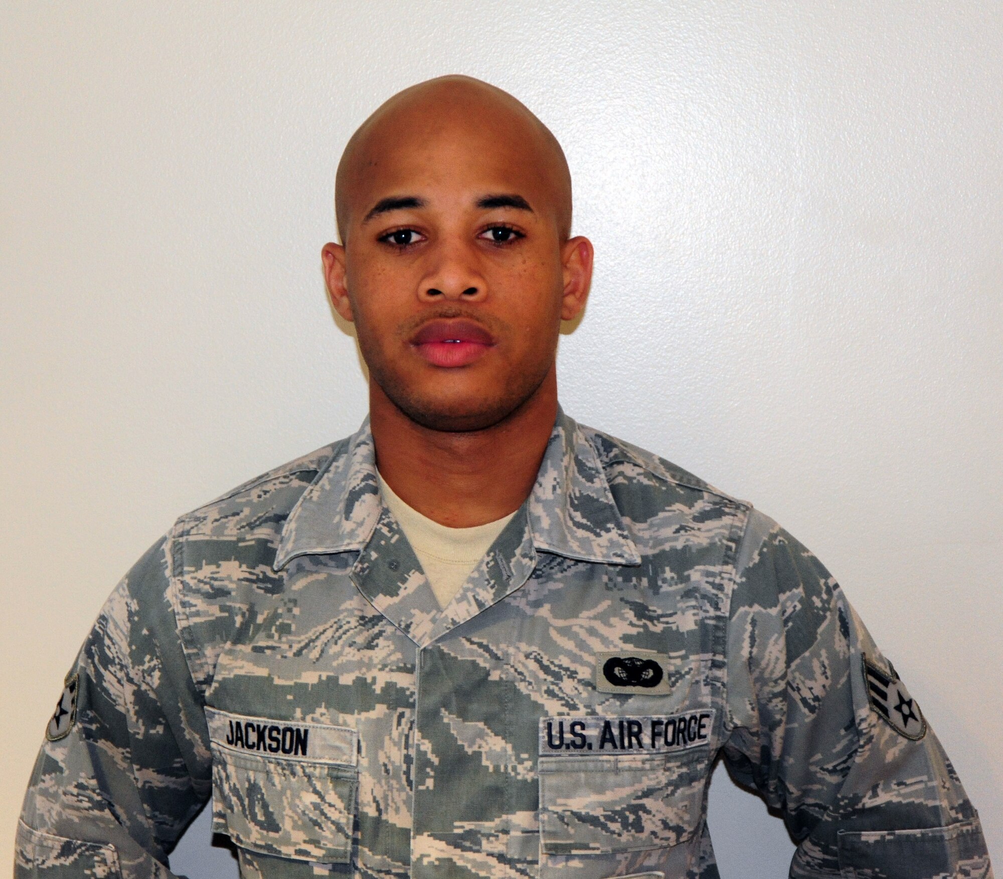 Senior Airman Derius Jackson, 42nd Security Forces Squadron, along with Staff Sgt. Donnell Fulton, 22nd Training Support Squadron administered aid to a civilian after a car crash Feb. 15. The two Airmen witnessed a serious motor vehicle crash involving a single vehicle that had rolled several times off of the interstate and down an adjacent hill. They were able to free the individual from the wreckage as the vehicle began to leak fuel and emit smoke. (Air Force photo/Airman 1st Class Christopher S. Stoltz)