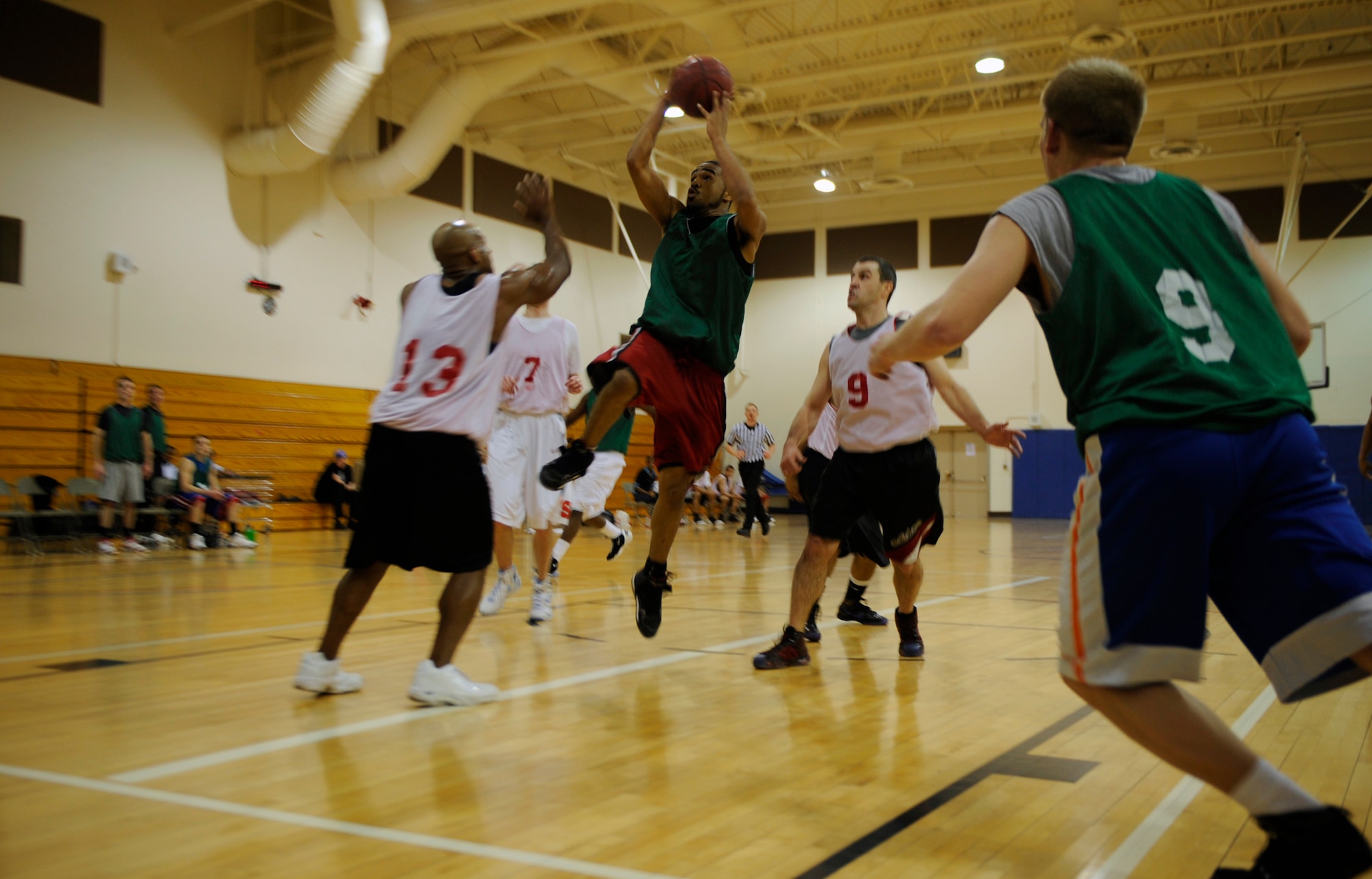MOUNTAIN HOME AIR FORCE BASE, Idaho – Marcus Parker, 366th Civil Engineering Squadron guard, goes up for a shot during the intramural basketball semifinals against the 366th Medical Group Feb. 28. CES made some big shots to take the lead with minutes left ending the game 52-48. (U.S. Air Force photo by Airman 1st Class Renishia Richardson)