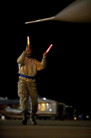 NELLIS AIR FORCE BASE, Nev. --  Airman Kahlil Permenter, 20th Aircraft Maintenance Squadron crew chief, taxies an F-16 Fighting Falcon during Red Flag 11-3, March 2.  Red Flag is a realistic combat training exercise involving the air forces of the United States and its allies. The exercise is hosted north of Las Vegas on the Nevada Test and Training Range.(U.S. Air Force photo by Airman 1st Class Matthew Lancaster)